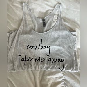 Size small, racer back tank. “Cowboy take me away”.